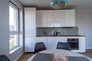 Modern, two bedroom, shipyard view apartment by Grand Apartments