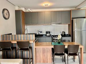 Lindo! Apto completo na Praia de Palmas! ZI05I