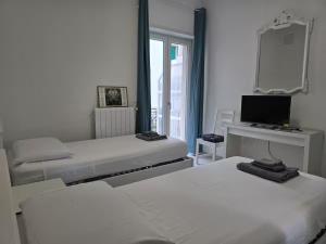 Casa Perla elegant apartment a stone throw from the sea and in the city center