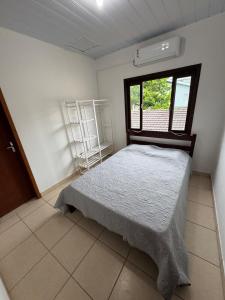 Casa com Piscina em Bombinhas