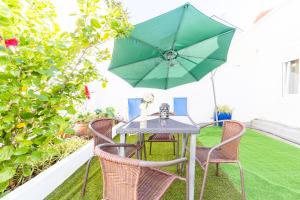 Peaceful 2-bedroom House with Garden at the heart of Benfica