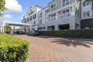 Steps to Lido Village and the Marina Heart of Lido Island 2 Car Garage