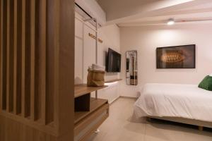 303 Balance and Design Loft with AC in Laureles area