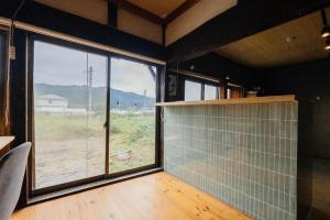 hinatabocco guesthouse kominka Twin room bed