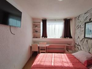 Casa Nova Estudio con Cama Queen y Kitchenette