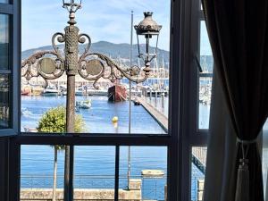 Holibai, Solpor, Ap boutique frente paseo marítimo, Baiona