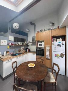 Maison de ville jardin derrière cité U à Gentilly