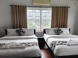 Townhouse Kozhikode Beach Formerly Point Avenue - 2-star hotels in Kozhikode