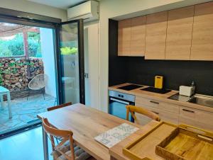 Coquet appartement avec patio privatif-Stationnement gratuit à proximité