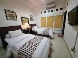Rumah Keluarga Homestay 4BR Syariah
