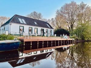 Ferienhaus Am Fehntjer Tief