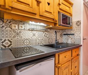 Cosy Apartment In Heart of Val Thorens Ski In-Out with WiFi