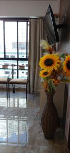 APARTAMENTO BOQUEIRÃO PRÉDIO FRENTE AO MAR COM GARAGEM WI-FI e AR