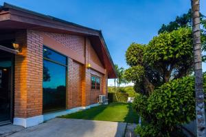 The Red Brick House Layan