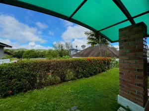 The Red Brick House Layan