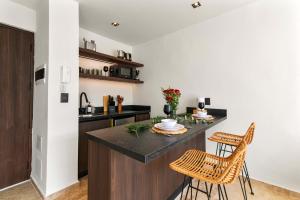 Stylish 1BR Condo with Private Pool & Balcony