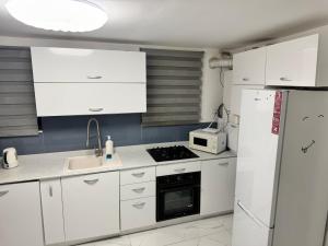 Lower-ground with two separate bedrooms near the center