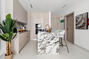 Stylish 1BR with PS5, Sauna and Kids Play Area