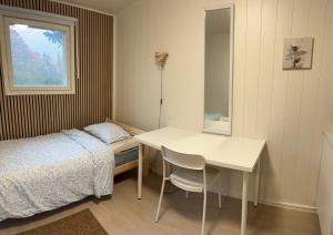 Small guesthouse in garden