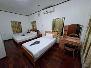 Twin House Guesthouse - Lao Experience