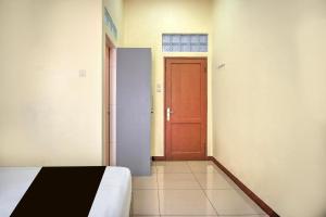 Hotel O Medan near Sun Plaza formerly Medan Baru House