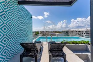 Brand new condo with Pool Steps to Beach and 5th