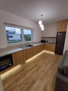 Mieszkania i Apartamenty