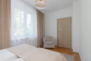 Atmospheric Apartment in a Green Area Pet-friendly by Noclegi Renters