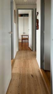 Wooden House In The Dunes Close To The Sea