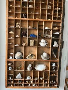 Wooden House In The Dunes Close To The Sea
