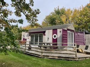 Purple CargoPod at Lee Wick Farm Cottages & Glamping