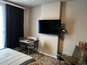 Boutique Leuven - self check in