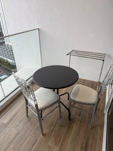 Quill Residence- Minimalist Urban Condo by Azmila