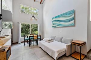 Beach walkable loft condo with pool