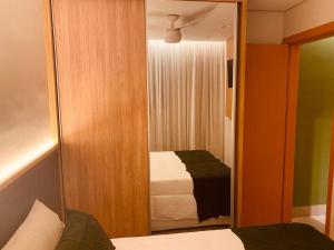 Apto de 2 quartos e Ar Condicionado perto do Praia Clube