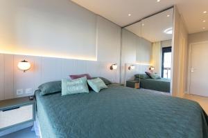 Apartamento 2 suítes com piscina em Canto Grande Bombinhas SC