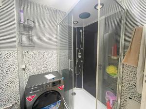 1BR Chic à Izdihar Clim, Wi-Fi & Cuisine Équipée