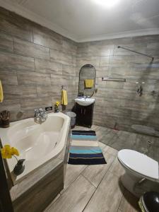 Bosveld In Die Stad Lodge