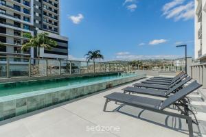 Acomodações completas e modernas em prédio com academia - MCP