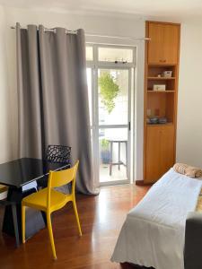 Savassi apartment with balcony, air conditioning and acoustic window