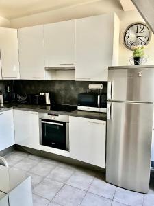 Studio Haut Haut de Gamme - Bain de lumière - Vue sur Paris