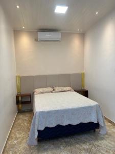 Suíte espaçosa com ar-condicionado no coração de Belém para o Círio