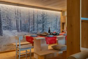 MAISON DI VOLPI - Il fascino della montagna, la comodità del centro