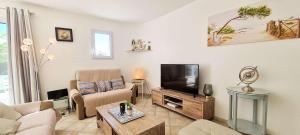 Superbe villa avec piscine chauffée à proximité de la plage