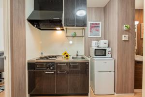 201 6-min walk from Higashi-Jūjō Station Cozy 1-Bedroom Apartment Direct Access to Akihabara & Ueno