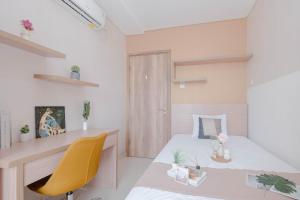Fully Furnished 2BR Apartment at Pejaten Park Residence By Travelio