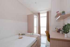 Fully Furnished 2BR Apartment at Pejaten Park Residence By Travelio