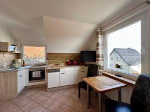 Ferienanlage in Klein Zicker Ferienwohnung 1 - Seeseite