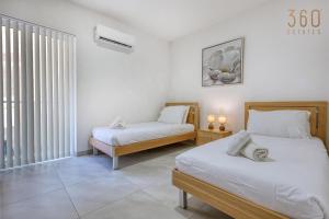 Live the Island Life,2BR in the Heart of Bugibba by 360 Estates