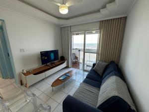 Vista deslumbrante e elegância frente mar!